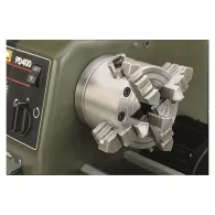 Universal strung cu patru bacuri cu auto-centrare